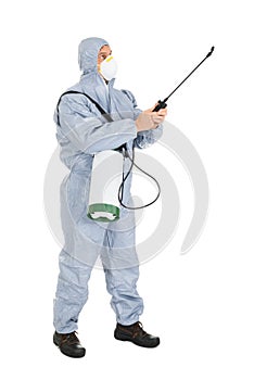 Pest control worker with pesticides sprayer photo