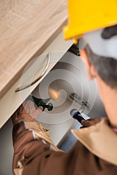 Pest control worker spraying chemicals