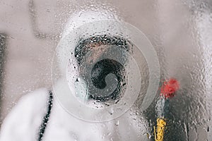 pest control worker standing in respirator