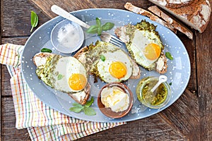 Pesto eggs, eggs fried in pesto