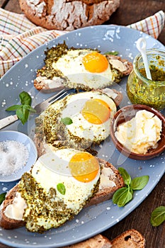 Pesto eggs, eggs fried in pesto