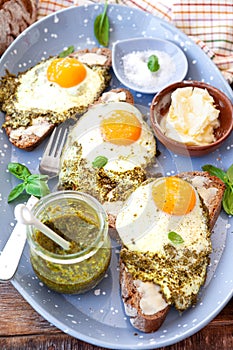 Pesto eggs, eggs fried in pesto