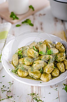 Pesto gnocchi, garlic and fresh herbs olive oil