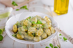 Pesto gnocchi, garlic and fresh herbs olive oil