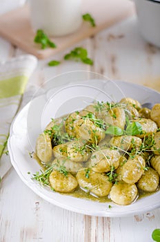 Pesto gnocchi, garlic and fresh herbs olive oil