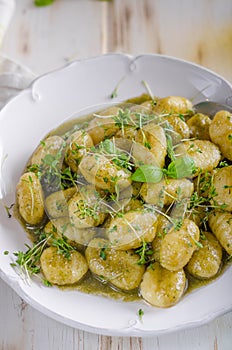 Pesto gnocchi, garlic and fresh herbs olive oil