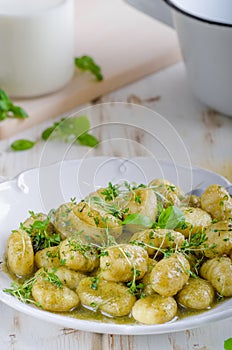 Pesto gnocchi, garlic and fresh herbs olive oil