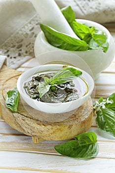 Pesto sauce of fresh green basil leaves