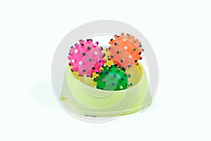 Pet bowl and rubber toys for dog or cat isolated