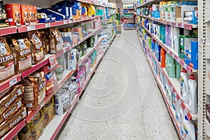 Pet food area and cleaning products in the supermarket of the commercial food chain Dia