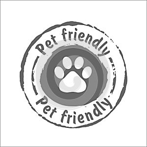 Pet friendly grunge stamp, gray isolated on white background, vector illustration.  Animal paw print vector illustration for your