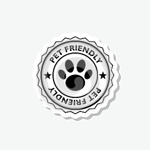 Pet paw or dog label, stamp or sticker with pet friendly text. Pet paw icon