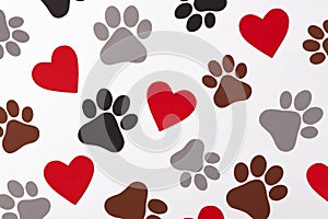 Pet paws on white background, dog paws pattern. National Puppy Day creative concept