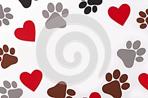 Pet paws on white background, dog paws pattern. National Puppy Day creative concept