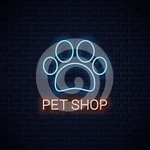 Pet shop neon . Neon pet paw on wall background