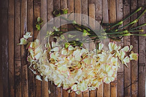 Petals flowers hart frame in form of flower wedding decoration