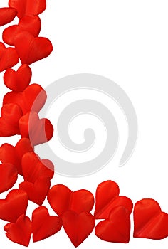 Petals in heart shape over white background - fra