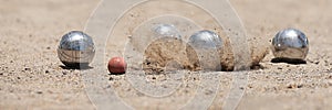 Petanque ball boules bowls on a dust floor