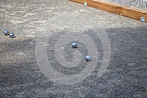 Petanque balls in the playing field photo
