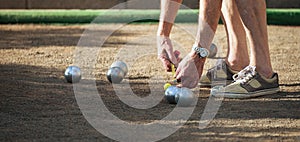 Petanque game,measuring the distance