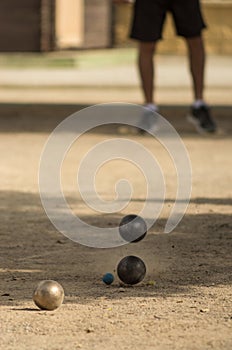 Petanque, game and sport with iron balls colliding with each other