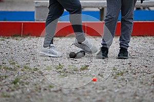 Petanque throwers on playground photo