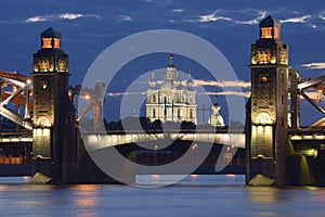 The Peter the Great Bridge against the background of the Smolny Cathedral, white night. Saint-Petersburg