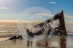 Peter Iderdale Shipwreck in Fort Stevens State Park on a sunny day, Pacific Coast, Astoria, Oregon photo