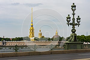 Peter and Paul cathedral and lamp on Trinity Troitsky bridge, Saint Petersburg, Russia