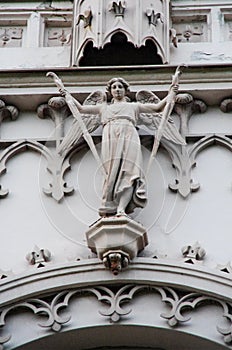 PETERGOF, RUSSIA - August, 2017: Gothic Chapel in Peterhof or Church of  Saint Alexander Nevsky. Sculptures adorning the facade of