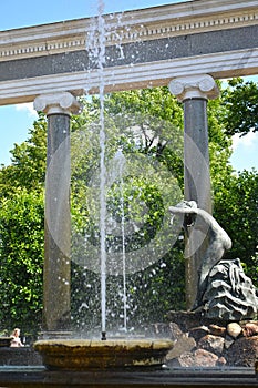 PETERHOF, RUSSIA - JULY 24, 2015: A statue Nympha Aganipa in the Lion's cascade