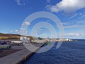 Peterson Quay at the Greenhead Base in the Shetland Islands with the Thun Grace Tanker moored alongside it.