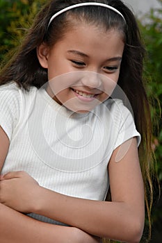 A Petite Girl And Laughter Closeup