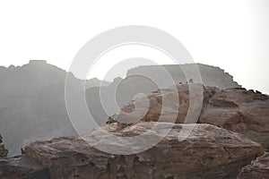 Petra, Jordan - ancient Nabatean city in red natural rock and with local bedouins, UNESCO world heritage