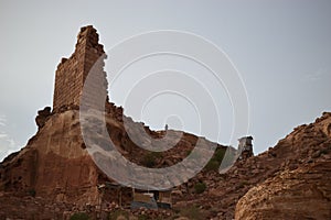 Petra, Jordan - ancient Nabatean city in red natural rock and with local bedouins, UNESCO world heritage