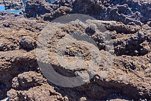 Petrified Lava Of Volcanic Rocks Next To The Atlantic Ocean In Hell In Garachico. April 14, 2019. Garachico, Santa Cruz De