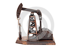Petrochemical industry, petroleum production and drilling for fossil fuel concept with miniature mechanical oil pump isolated on