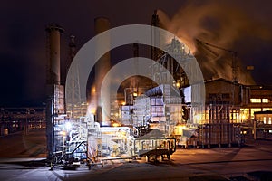 Petrochemical plant in night. Ammonia synthesis complex. Long exposure photography.