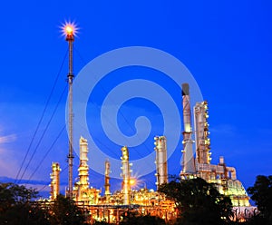 Petrochemical plant oil refinery at twilight