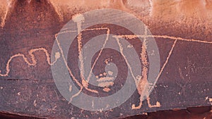 Petroglyphs on The Birthing Scene Rock in Moab, Utah