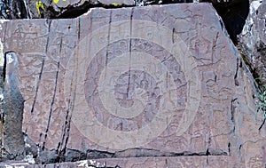 Petroglyphs of Kalbak-Tash in Altai, Siberia photo