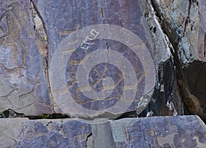 Petroglyphs of Kalbak-Tash in Altai, Siberia photo