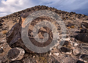 Petroglyphs on the mountain photo
