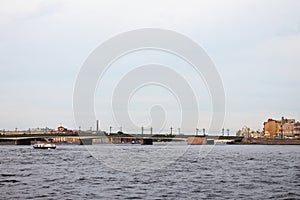 Petrogradskaya embankment, drawbridge, thrown between Vasilievsky Island and the central part of the city