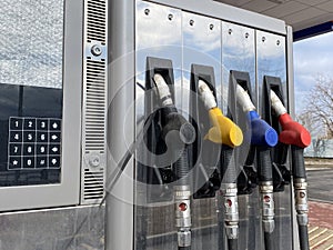 Petrol car refueling. Opening of a new Gas station. Fuel pump close up. Color fuel gasoline dispenser. Empty gas station