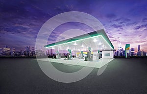 Petrol gas station at night with city building