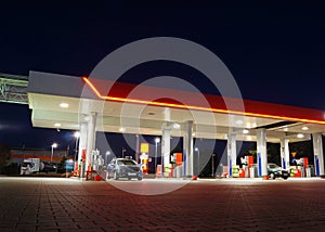 Petrol gas station at night with lights