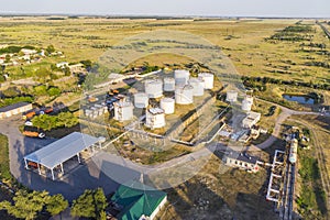 Petrol station and petrol tanks in the background. Oil storage photo