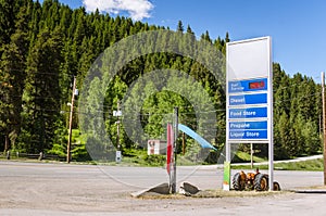 Petrol station sign along a highway