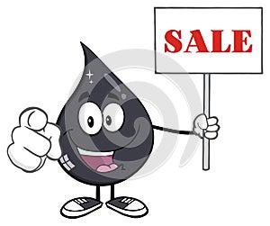 Petroleum Or Oil Drop Cartoon Character Pointing At You And Holding Holding Up A Sale Sign